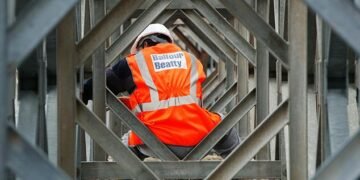 Performance: Balfour Beatty, Britain's largest building contractor, recorded a £232million underlying operating profit from its earnings-based businesses last year