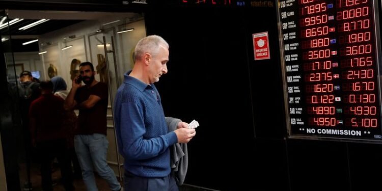 Dollar hits 5-week high on inflation worries; lira drops, baht soars