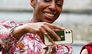 In the pink: Sharon White arrives at the Coronation