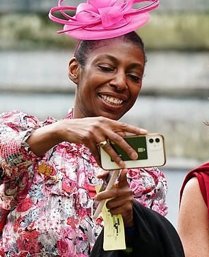 In the pink: Sharon White arrives at the Coronation