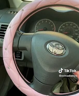 One clip, which was posted by user @extraababyy shows her putting bling all over the steering wheel, fluffy covers on the gear stick and hand brake