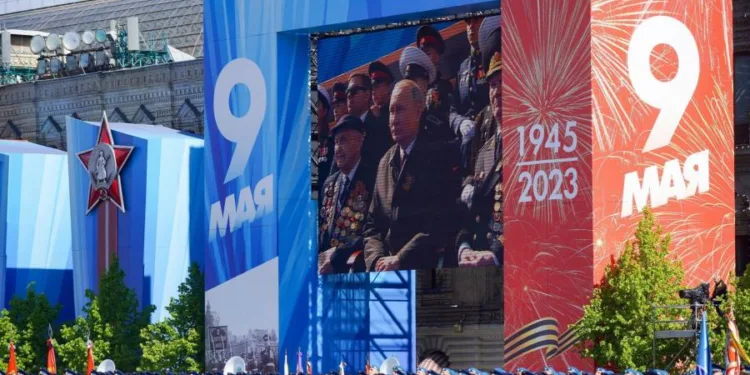 Vladimir Putin defiant over Ukraine war at modest Victory Day parade