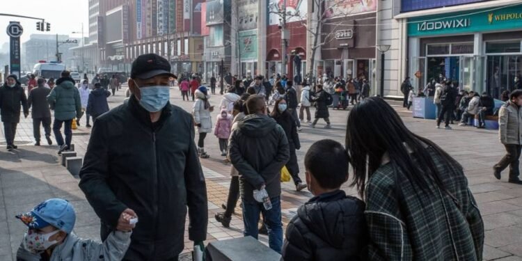 China cuts benchmark rates to boost economy