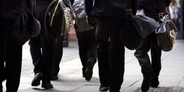 Parents of secondary school children are paying on average £422 per year on uniform and £287 for primary school children, research by The Children's Society shows (Stock Photo)