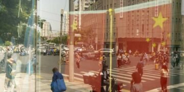 Chinese economic activity slows further as Beijing promises stimulus