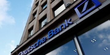 Deutsche Bank braces for spike in bad loans