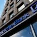 Deutsche Bank braces for spike in bad loans
