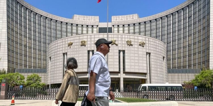 China Cuts Rate by Most Since 2020 as Economic Woes Deepen
