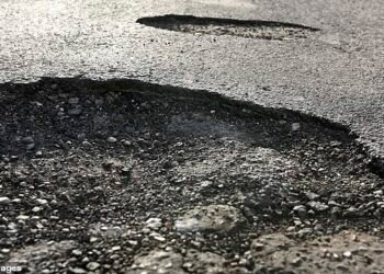 Wet weather in July caused the number of pothole-related breakdowns to jump to a five-year high