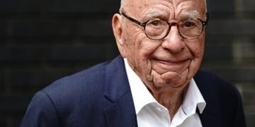 Stepping down: Media mogul Rupert Murdoch is retiring after 70 years - with second son Lachlan to take over the family dynasty