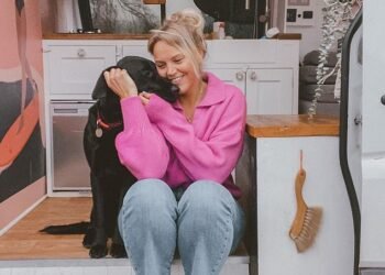 Van life: Amy Nicholson with her dog Indie