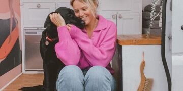 Van life: Amy Nicholson with her dog Indie