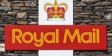 Writing on the wall?: The postal watchdog, Ofcom, said that it would review Royal Mail's legal requirement to deliver letters from Monday to Saturday