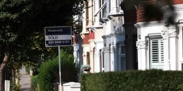 Property prices will continue to tumble in the short-term in the face of higher mortgage rates with 'little prospect of any turnaround in the immediate future' Royal Institution of Chartered Surveyors (RICS) said (Stock Image)