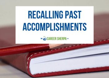 A notebook being used to record past accomplishments