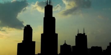 The crashing office market will deepen the economic 'doom loop' for America's cities, economist says