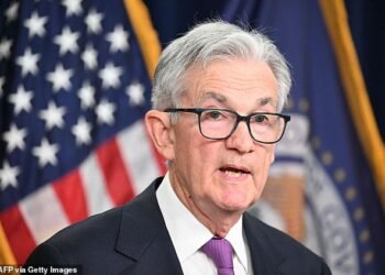 Cautious: US Federal Reserve chairman Jerome Powell (pictured) said the process of getting inflation down to its 2% target still had a ‘long way to go’