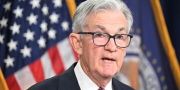 Cautious: US Federal Reserve chairman Jerome Powell (pictured) said the process of getting inflation down to its 2% target still had a ‘long way to go’