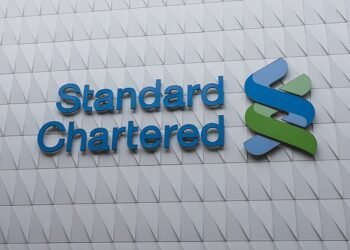 BUSINESS LIVE: Standard Chartered profits slump; CAA hikes airline charges cap; WPP slashes forecast