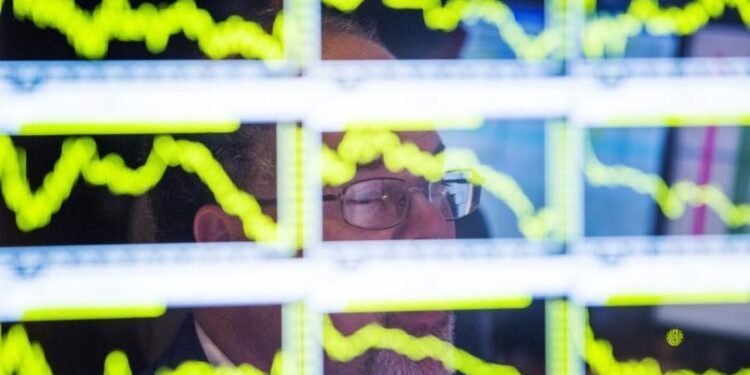 Ericsson shares volatile after results, $2.9 billion charge By Reuters