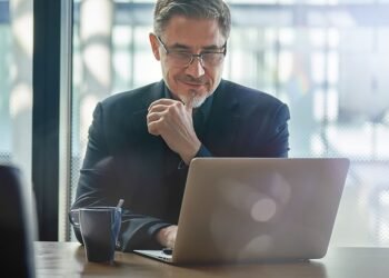Fewer than one in ten workers are now in low-paid jobs, official figures show, suggesting that Britain is increasingly a nation of middle earners (Stock Image)