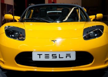 Musk now says it's 'pointless' to build a $25,000 Tesla for human drivers By Reuters