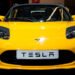 Musk now says it's 'pointless' to build a $25,000 Tesla for human drivers By Reuters