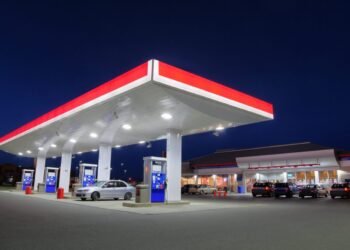 Car Refueling at Gas Station during the Night
