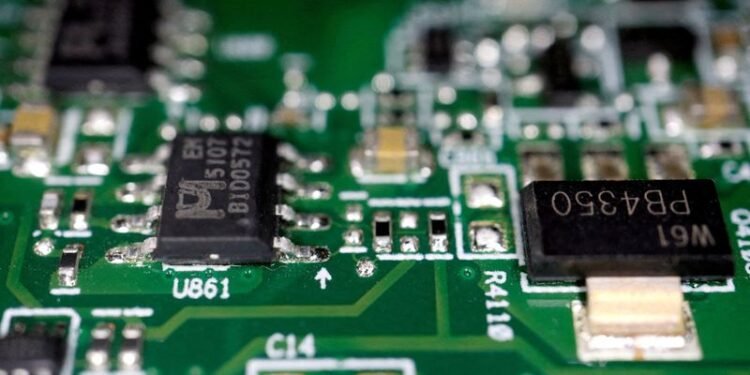 China says Taiwan seeks to give away chip industry to US