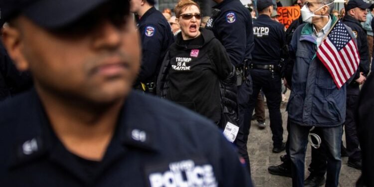 Nine arrested at New York Tesla dealership as anti-Musk protests break out