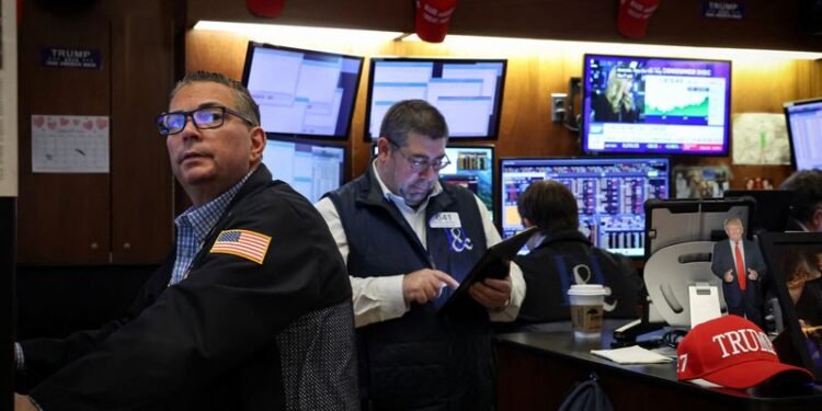 Wall St rises in choppy trading, Fed comments provide tailwind