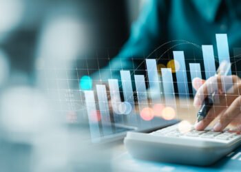 Businesswoman use laptop and calculator analyzing company growth, future business growth arrow graph, development to achieve goals, business outlook, financial data for long term investment.