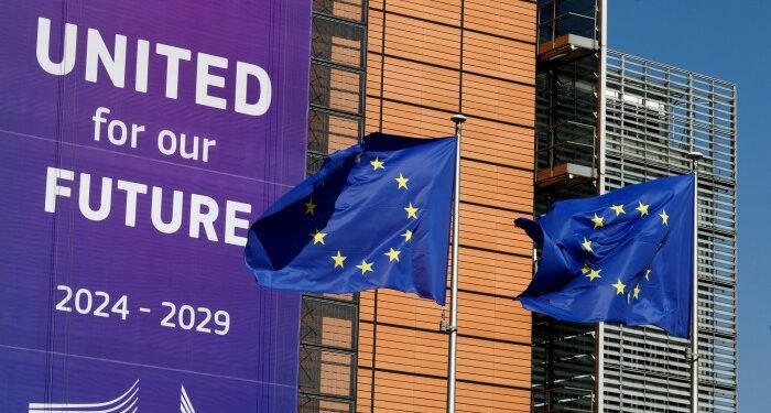 European Union flags flutter outside the European Commission headquarters in Brussels, Belgium