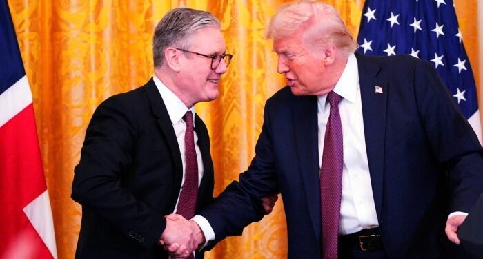 Britain’s Prime Minister Keir Starmer, left, and US President Donald Trump shake hands at a joint press conference in the East Room at the White House on February 27