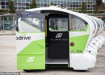 Aconvoy of Aurrigo autonomous pods in Milton Keynes