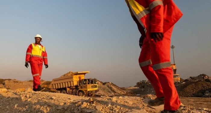 Workers at the Tenke Fungurume copper and cobalt mine in DR Congo