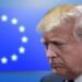 Donald Trump with the circle of 12 gold stars representing the EU in the background