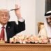 US President Donald Trump, left, and Qatar’s emir Sheikh Tamim bin Hamad al-Thani take part in a signing ceremony at the Royal Palace in Doha on May 14 2025