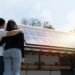 Couple looking at solar panels.