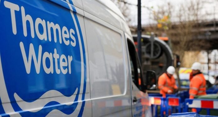 Thames Water employees carry out repair and maintenance in London