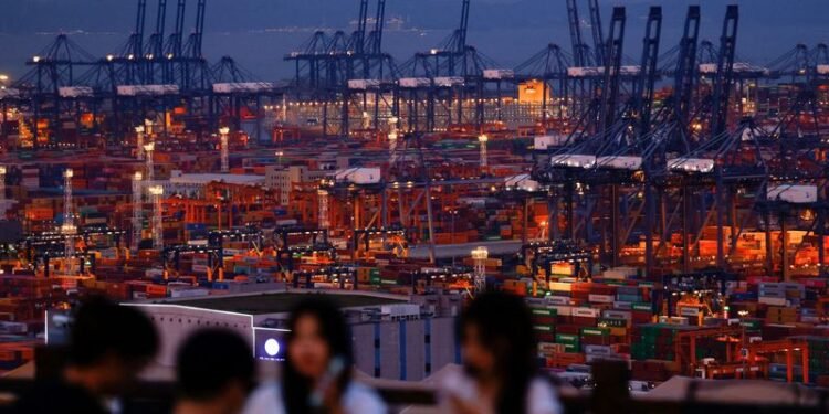 Wary investors hope US-China talks cool high-stakes trade war