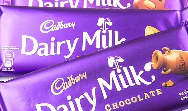 Counting its profits: More than 70 MPs and peers have accused Cadbury owner of 'funding Russia's war machine' by continuing to trade in the country