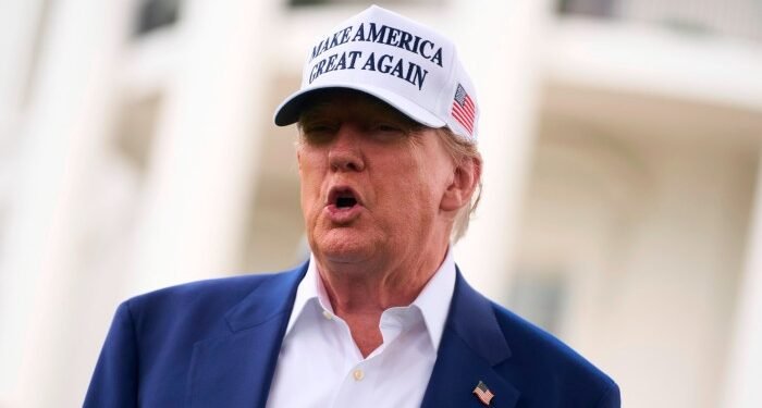 Donald Trump speaks to reporters on Wednesday