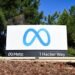 The Meta logo marks the entrance of their corporate headquarters in Menlo Park, California