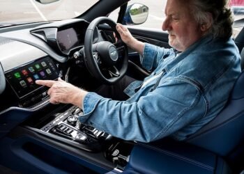 Apple of his eye: Ray tries out the new Apple Car Play Ultra dashboard system