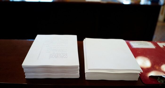 A copy of US President Donald Trump’s 940-page tax and spending bill is seen on a desk in the Senate chamber on Capitol Hill in Washington, DC