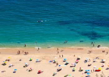 The Best Beaches in Lisbon for Surfing, Cycling, and Doing Absolutely Nothing