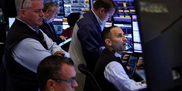 Nasdaq, S&P 500 end lower as investors sell tech, buy less pricey sectors