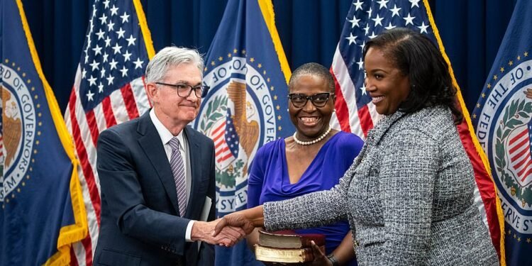 The White House piled pressure on senior Federal Reserve official Lisa Cook (pictured right) to stand aside after Donald Trump attempted to fire her.