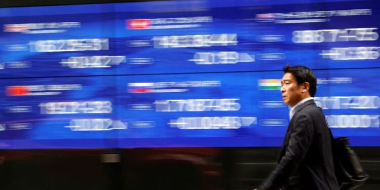 Stocks hesitate in Asia with a lot riding on the Fed